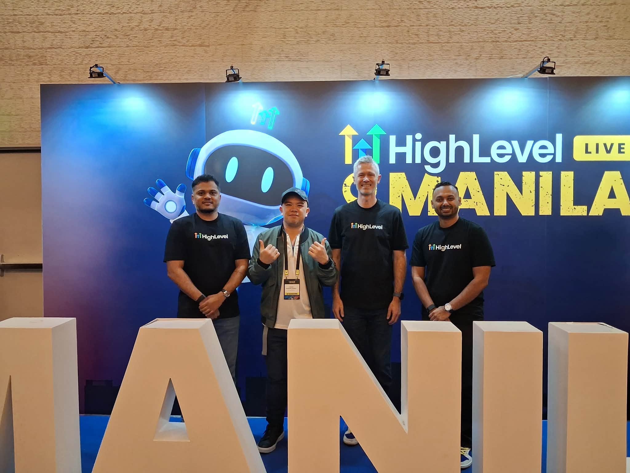 Druu Rivera with the HighLevel founders at HighLevel LIVE Manila 2026